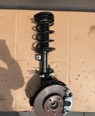 Ford Focus Front shock absorber with coil spring JX6118K045XBG