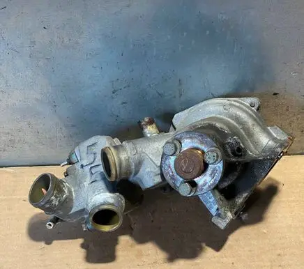 SsangYong Chairman W Thermostat housing 1042030374