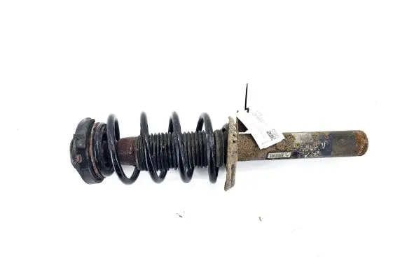 Volkswagen Caddy Front shock absorber with coil spring