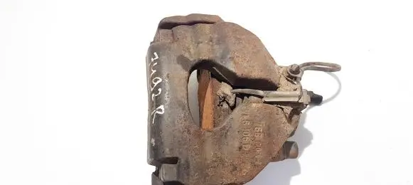 Volkswagen Touareg I Front brake caliper 7l6106d