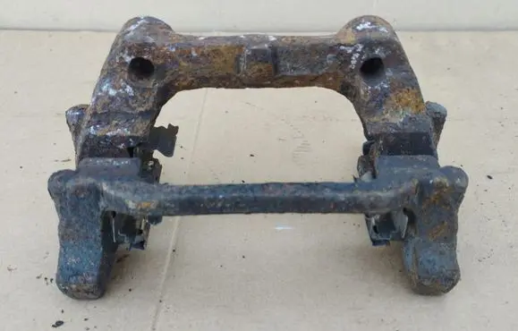 Toyota Avensis T270 Brake caliper pad carrier rear 