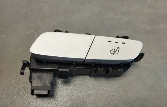 Seat heating switch