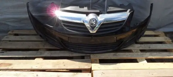 Opel Corsa D Front bumper upper radiator grill
