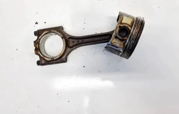 Piston with connecting rod