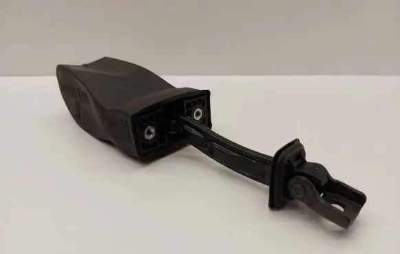 Front door check strap stopper