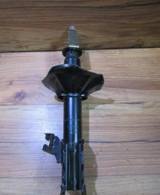 Nissan Sunny Front shock absorber/damper 5430354y00