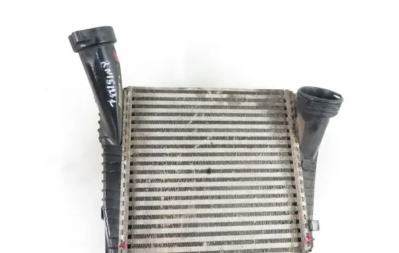 Volkswagen Touareg I Intercooler radiator 7L0145803A