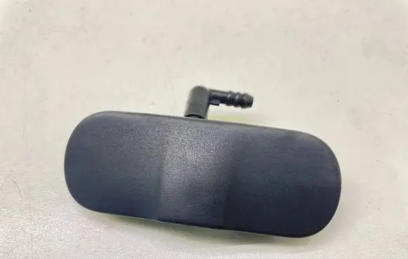 Windshield washer spray nozzle