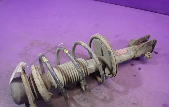 Front shock absorber with coil spring