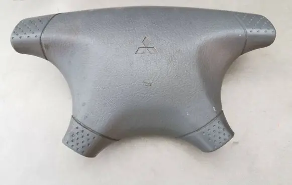Mitsubishi Lancer Steering wheel trim 