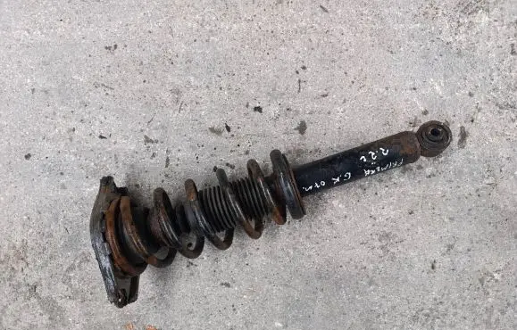Nissan Primera Rear shock absorber with coil spring 
