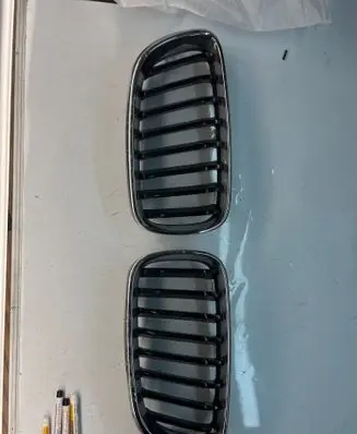 Front bumper upper radiator grill