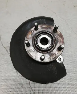 Front wheel hub spindle knuckle