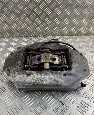 Volkswagen Touareg II Front brake caliper 7P6615105AE