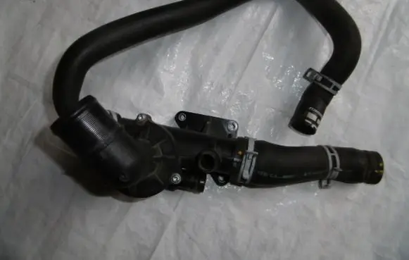 Thermostat/thermostat housing