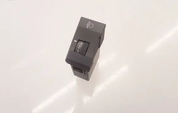 KIA Carens I Headlight level height control switch 3410017M012