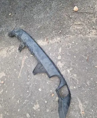 Rear bumper trim bar molding