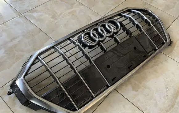 Front bumper upper radiator grill