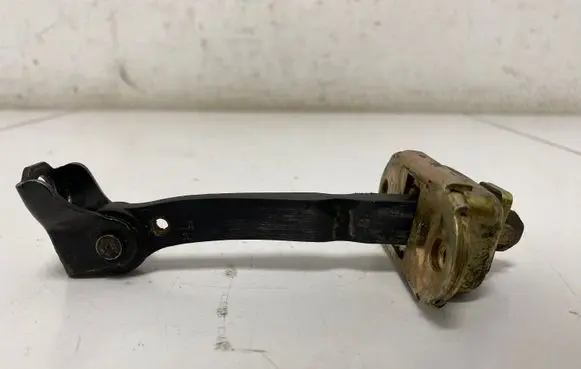 Toyota Yaris Front door check strap stopper