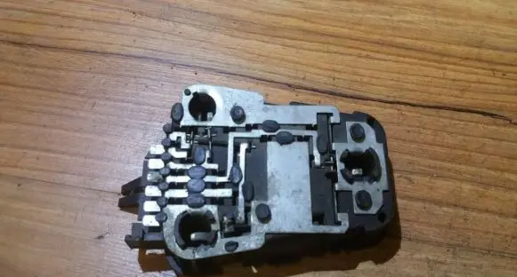Tail light bulb cover holder