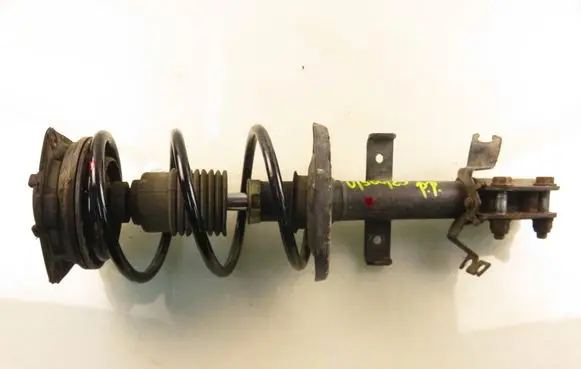 Renault Clio III Front shock absorber with coil spring
