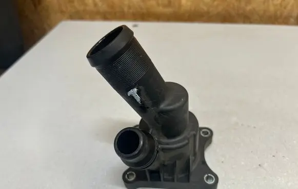 Thermostat/thermostat housing