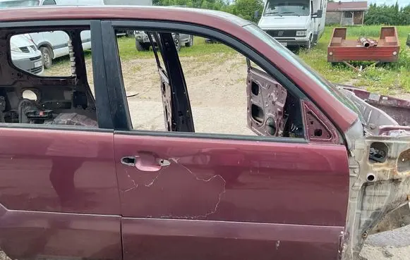 Toyota Land Cruiser (J120) Front door