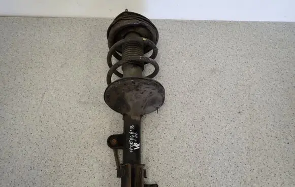 KIA Sportage Front shock absorber with coil spring