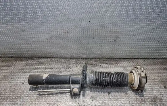 Volkswagen Caddy Front shock absorber/damper 1T0412103A