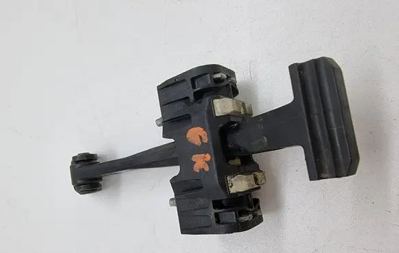 Rear door check strap stopper