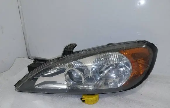 Nissan Primera Headlight/headlamp 260109F610 89003047 097052000