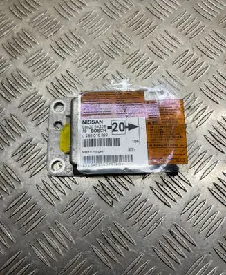 Nissan Navara D40 Airbag control unit/module 0285010822