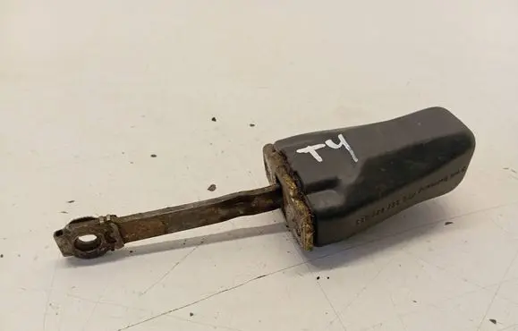 Front door check strap stopper