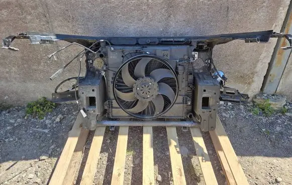 Top upper radiator support slam panel