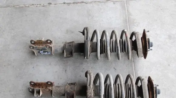 Front shock absorber with coil spring