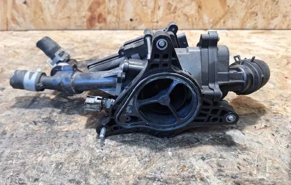 Thermostat/thermostat housing