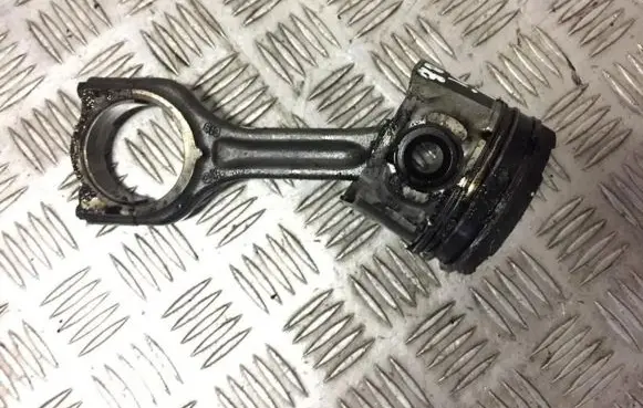 Piston with connecting rod