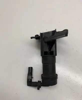 Chrysler Voyager Headlight washer spray nozzle