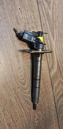 Volkswagen PASSAT B6 Fuel injector 0445116030 03L130277