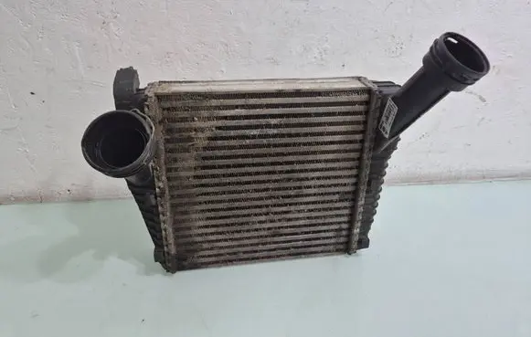Volkswagen Touareg I Intercooler radiator 7L6145804