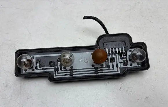 Volkswagen Caddy Tail light bulb cover holder 2K0945257A