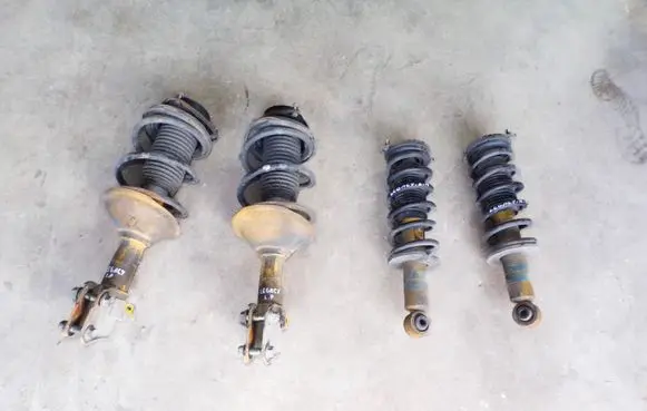 Subaru Legacy Set of springs and shock absorbers (Front and rear) 