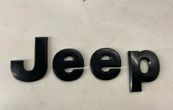 Jeep Grand Cherokee Manufacturer badge logo/emblem 68193400AA