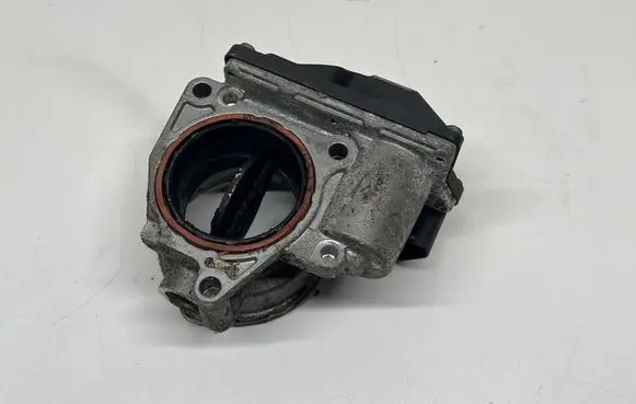 Volkswagen Touran I Throttle valve 03G128063M 1003091001 A2C53324665