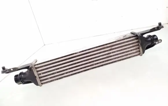Opel Corsa D Intercooler radiator 55702004