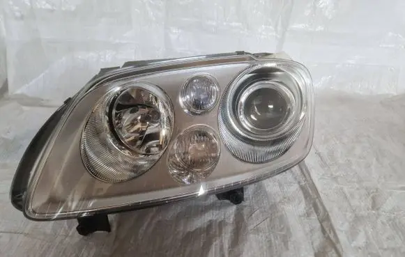 Volkswagen Touran I Headlight/headlamp 1T0941031K