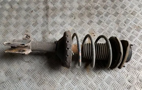 Subaru Forester SG Front shock absorber with coil spring