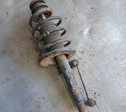 Volkswagen Sharan Front shock absorber with coil spring