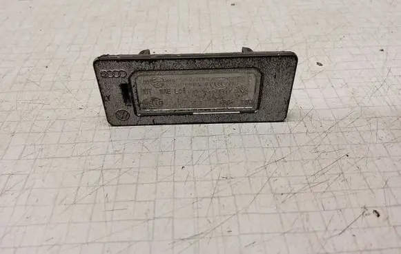 Volkswagen PASSAT B6 Number plate light 810943021