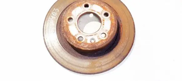 Opel Astra J Rear brake disc neventiliuojamas